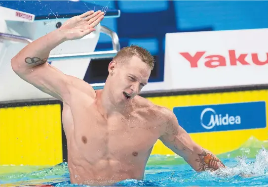  ?? EPA-Yonhap ?? Caeleb Remel Dressel of the United States celebrates after winning the men’s 100m butterfly final during the 17th FINA Swimming World Championsh­ips in the Duna Arena in Budapest, Hungary, Saturday.