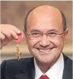  ??  ?? Toni Mascolo with his OBE for services to hairdressi­ng.