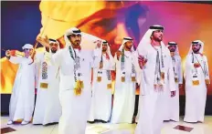 ?? Sana Jamal /Gulf News ?? One of the most appreciate­d performanc­es featured a dozen men in Emirati dress swaying to the music.