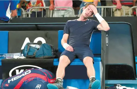  ?? Reuters-Yonhap ?? Britain’s Andy Murray looks dejected after losing the match against Spain’s Roberto Bautista Agut at Melbourne Arena, Melbourne, Australia, Monday.