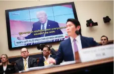  ?? — AFP photo ?? Hur testifies in front of a video of Trump during a hearing held by the House Judiciary Committee in Washington, DC.