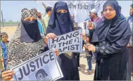  ?? PTI ?? Women take part in a protest against the Kathua and Unnao rape cases in Ahmedabad on Sunday.