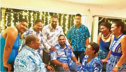  ??  ?? Viliame Kikau (stadning right) with his family, celebratin­g his brother Jope’s wedding in Fiji. Photo: Kikau Family