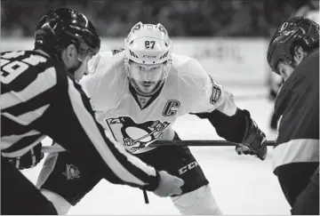  ?? Mike Carlson Getty Images ?? PITTSBURGH CENTER Sidney Crosby “cheats” on his faceoffs, according to San Jose’s Logan Couture.