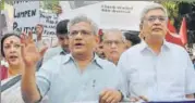  ?? PTI FILE ?? While general secretary Sitaram Yechury (left) is of the opinion that all nonbjp opposition parties, including Congress, should come together, Prakash Karat (right) is apprehensi­ve of an alliance.