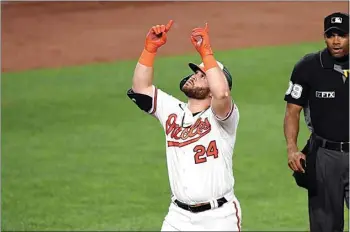  ?? TERRANCE WILLIAMS / AP ?? The Orioles’ DJ Stewart celebrates after hitting a two-run home run off Angels starting pitcher Shohei Ohtani during the fourth inning of Wednesday’s game in Baltimore.