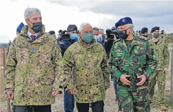  ?? ?? From left: Defence minister João Gomes Cravinho, prime minister António Costa and Admiral António da Silva Ribeiro, Chief of the General Staff of the Portuguese Armed Forces during a visit to the Santa Margarida Military Camp on Tuesday, March 22