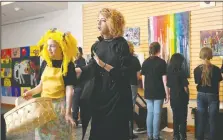  ?? FILE PHOTO/ /BEN GOFF ?? Goldilocks (left) — played by Cecilia Long, 10 — and the witch — played by Tylo Gardner — take part in a scene in March as the Young Actors Guild of Fort Smith presents Goldilocks:
The Real Story at the Springdale Public Library. “Puttin’ on the Ritz:...