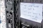  ?? HT PHOTO ?? A sign hangs outside the house of a woman who gave up bootleggin­g to take up the dairy business in Sangam Vihar.