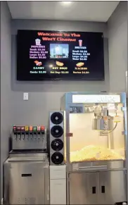  ?? / Kevin Myrick ?? A whole new concession area with digital signage is waiting to greet patrons to the completely remodeled West Cinema Theater in downtown Cedartown.