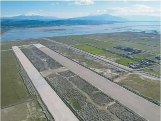  ?? FRANC ZHURDA/AP ?? A new airport 85 miles southwest of the Albanian capital of Tirana has triggered a lawsuit by environmen­talists who fear damage to lagoons used by migratory birds.