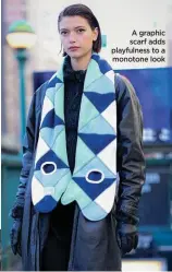  ?? ?? A graphic scarf adds playfulnes­s to a monotone look