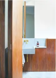  ??  ?? BATHROOM The children’s bathroom is on the top floor, tucked into the pitch-roof space created by one of the dormer windows.
Similar wallmounte­d brass tap, £960, The Water Monopoly