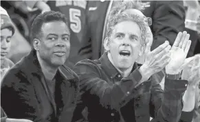  ?? BRAD PENNER/USA TODAY SPORTS ?? Actors and comedians Chris Rock, left, and Ben Stiller sit court side during a game between the Knicks and Heat at Madison Square Garden on March 29, 2023.