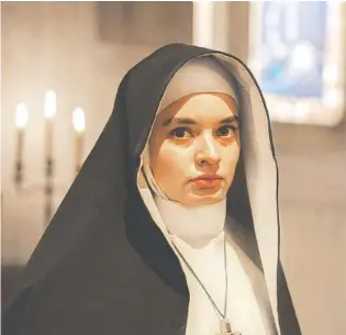  ?? AP PHOTO/JUSTIN LUBIN ?? Ingrid Bisu in a scene from “The Nun.”