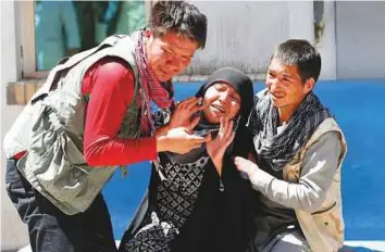  ?? Reuters ?? Relatives of victims mourn at a hospital in Kabul. The blast took place in Dasht-e-Barchi, an area of western Kabul inhabited by many members of the mainly Shiite Hazara minority.