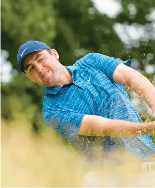  ?? CHARLIE RIEDEL/AP ?? Scottie Scheffler hits on the sixth hole during the second round of the U.S. Open golf tournament at The Country Club on Friday in Brookline, Mass.