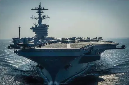  ?? AFP FILE PIC ?? USS ‘Carl Vinson’ was ordered by US President Donald Trump to sail to waters off the Korean peninsula.