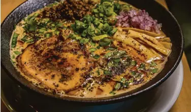  ?? John Storey / Special to the Chronicle 2016 ?? The spicy lamb ramen at Mensho Tokyo in San Francisco as seen in 2016. Mensho’s newest restaurant will focus on miso broths and developing ramen specifical­ly for takeout, a well-known culinary challenge.