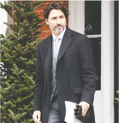  ?? Adrian Wyld / the cana dian pres ?? Prime Minister Justin Trudeau steps out of Rideau Cottage for a daily briefing with the media in Ottawa on Friday.