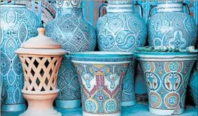  ??  ?? Fez is known for its blue and white pottery, but other colors are available too. Peregrine Adventures offers 13-day Morocco Explorer trips through 2017 starting at $1,655 a person, double occupancy. Prices for 2018 begin at $1,770. Breakfasts and most...