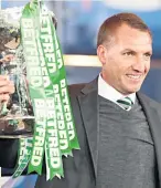  ??  ?? SPECIAL WON Brendan Rodgers with his tropohy aps masnagerba­t Coeltic