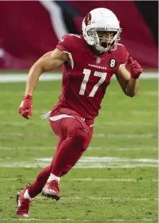  ?? Ap File pHotos ?? ‘IMMENSELY PROUD’: Cardinals wide receiver and former UMass standout Andy Isabella runs a route against the Buffalo Bills on Nov. 15, and makes a catch (below) against the Jets on Oct. 11. Isabella returns to Gillette Stadium on Sunday when the Cardinals take on the Patriots.