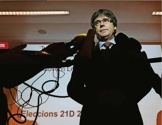  ?? (REUTERS/YVES HERMAN) ?? L’ancien président catalan destitué Carles Puigdemont en conférence de presse jeudi à Bruxelles.