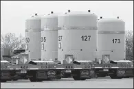  ?? AP/SUSAN MONTOYA BRYAN ?? Empty nuclear-waste shipping containers sit in front of the Waste Isolation Pilot Plant near Carlsbad, N.M., in March.