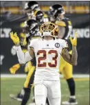  ?? AP photo ?? Washington’s Ronald Darby reacts after an intercepti­on by teammate Jon Bostic late in the fourth quarter Monday.