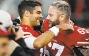  ?? John Hefti / Associated Press ?? Niners quarterbac­k Jimmy Garoppolo hugs teammate Daniel Kilgore (67) after Sunday’s 25-23 victory over the Titans at Levi’s Stadium.