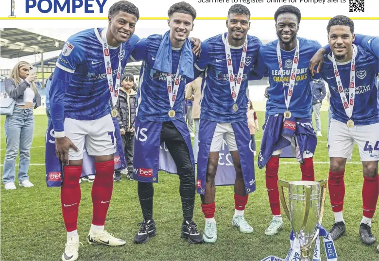  ?? ?? Kusini Yengi, Josh Martin, Tino Anjorin, Abu Kamara, Myles Peart-harris and Christian Saydee with the League One silverware