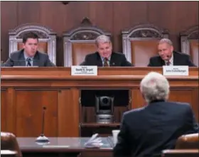  ?? SEN. ARGALL’S OFFICE ?? The Senate Majority Policy Committee listens to the Conservati­ve Leaders for Education’s Dr. Bill Bennett at a public hearing in the state Capitol on the recent U.S. Supreme Court decision on Janus v AFSCME. Senator David G. Argall (R-29), center, chaired the hearing and was held at the request of Senator John H. Eichelberg­er, Jr. (R-30), right.