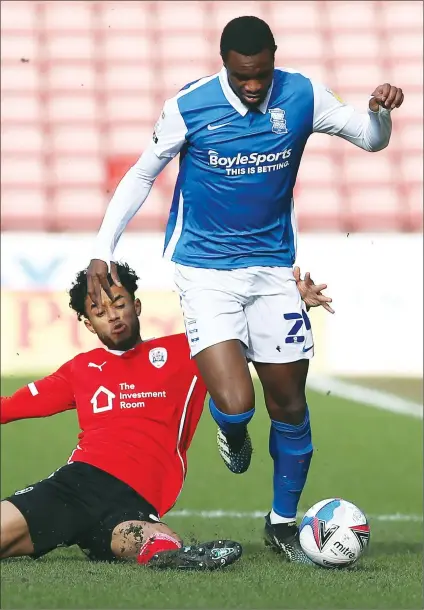  ?? PICTURE: Richard Parkes ?? ON THE RUN: Birmingham’s Rakeem Harper is tackled by Barnsley’s Romal Palmer