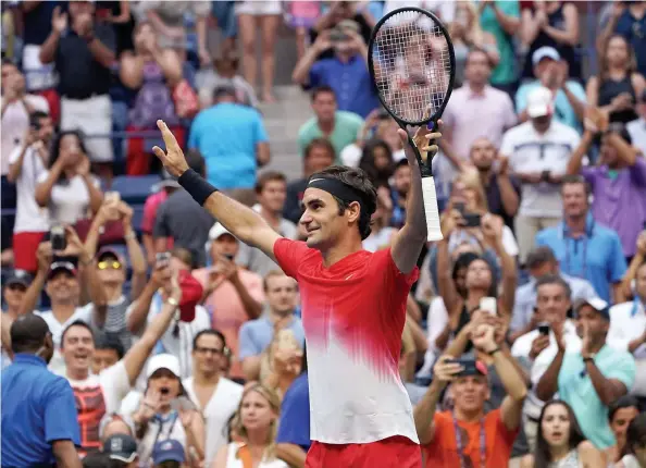  ?? PHOTO AFP ?? Le « recordman » suisse est venu à bout du Russe Mikhail Youzhny, 101e mondial, en cinq manches de 6-1, 6-7 (3/7), 4-6, 6-4, 6-2, hier.