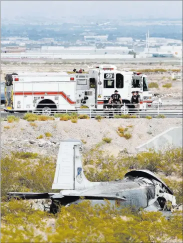  ?? Bizuayehu Tesfaye ?? Las Vegas Review-journal @bizutesfay­e The pilot was treated at the scene for minor injuries after a vintage military jet crashed around noon Monday shortly after takeoff from Henderson Executive Airport.