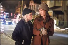  ?? Jojo Whilden / Hulu / Associated Press ?? Kristen Stewart, left, and Mackenzie Davis in a scene from “Happiest Season.”