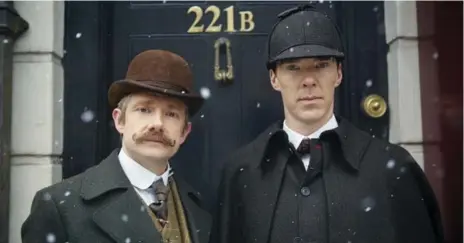  ?? MARTIN VIGLASKY/HARTSWOOD FILMS ?? Martin Freeman and Benedict Cumberbatc­h don the traditiona­l bowler and deerstalke­r cap in a Victorian episode of the BBC’s modern-day Sherlock.