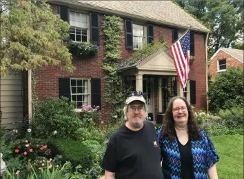  ?? Kevin Kirkland/ Post- Gazette ?? Bruce Sogoloff and his sister, Lori Gorman, in front of the Mt. Lebanon house where they grew up.