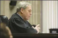  ?? ANTONIO PEREZ/TRIBUNE ?? Judge Lawrence Flood, shown in 2020, was one of the slowest judges at the main Cook County courthouse in handling murder cases, the Tribune found.