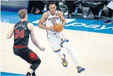  ?? [SARAH PHIPPS/ THE OKLAHOMAN] ?? Oklahoma City's Darius Bazley (7) goes the basket as Chicago's Lauri Markkanen (24) during fourth quarter of the Thunder's 127-125 win Jan. 15.