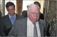  ?? AP PHOTO ?? In this 2008photo, Jerome Corsi, right, arrives at the immigratio­n department in Nairobi, Kenya. Corsi, a conservati­ve writer and associate of President Donald Trump confidant Roger Stone, says he is in plea talks with special counsel Robert Mueller’s team.