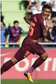  ?? AFP ?? Substitute Paulinho completed Barcelona’s fightback