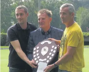  ??  ?? ●● Collecting the new Unsworth Shield are winners Ant Dingle (Bollington Bowling Club) and Mike Collier (Pack Horse Bowling Club with main sponsor Jeremy Unsworth of Unsworth Funeral Directors