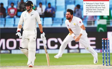  ?? AP ?? Pakistan’s Yasir Shah bowls during the third day of the second Test against New Zealand in Dubai yesterday.