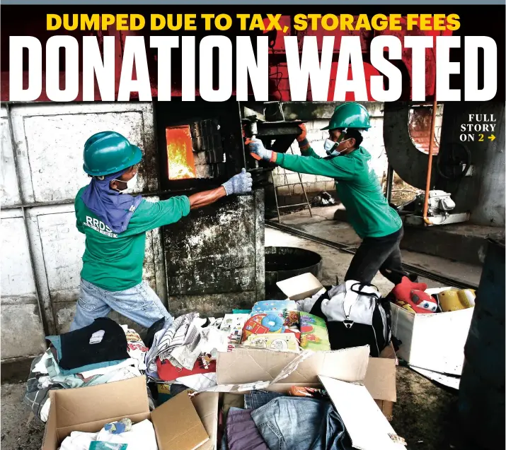  ?? SUNSTAR FOTO / ALLAN CUIZON ?? YOLANDA RELIEF GOODS. Four vans’ worth of relief goods from foreign countries never got to the survivors of 2013’s supertypho­on Yolanda after the Bureau of Customs held them for the donors’ unwillingn­ess to pay duties and taxes on them. Yesterday, the bureau burned the goods.