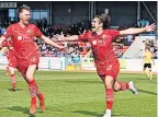  ?? ?? Wild scenes Jack Leitch celebrates his goal