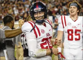  ?? AP ?? After months of waiting in eligibilit­y limbo, Shea Patterson was granted his release from Ole Miss with an NCAA waiver making him immediatel­y eligible for Michigan.