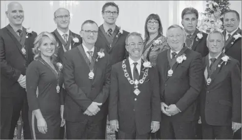  ?? DAVE STEWART/THE GUARDIAN ?? The 2018-2022 Charlottet­own city council was officially sworn in on Thursday by P.E.I. Court of Appeal Justice Michele Murphy. The new council is, front row, from left, Alanna Jankov, Terry MacLeod, Mayor Philip Brown, Mike Duffy and Kevin Ramsay. Back row, from left, are Greg Rivard, Terry Bernard, Deputy Mayor Jason Coady, Julie McCabe, Mitchell Tweel and Bob Doiron.