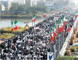  ?? REUTERS ?? Miles de iraníes marcharon hoy a favor del gobierno de Hasan Rohaní.